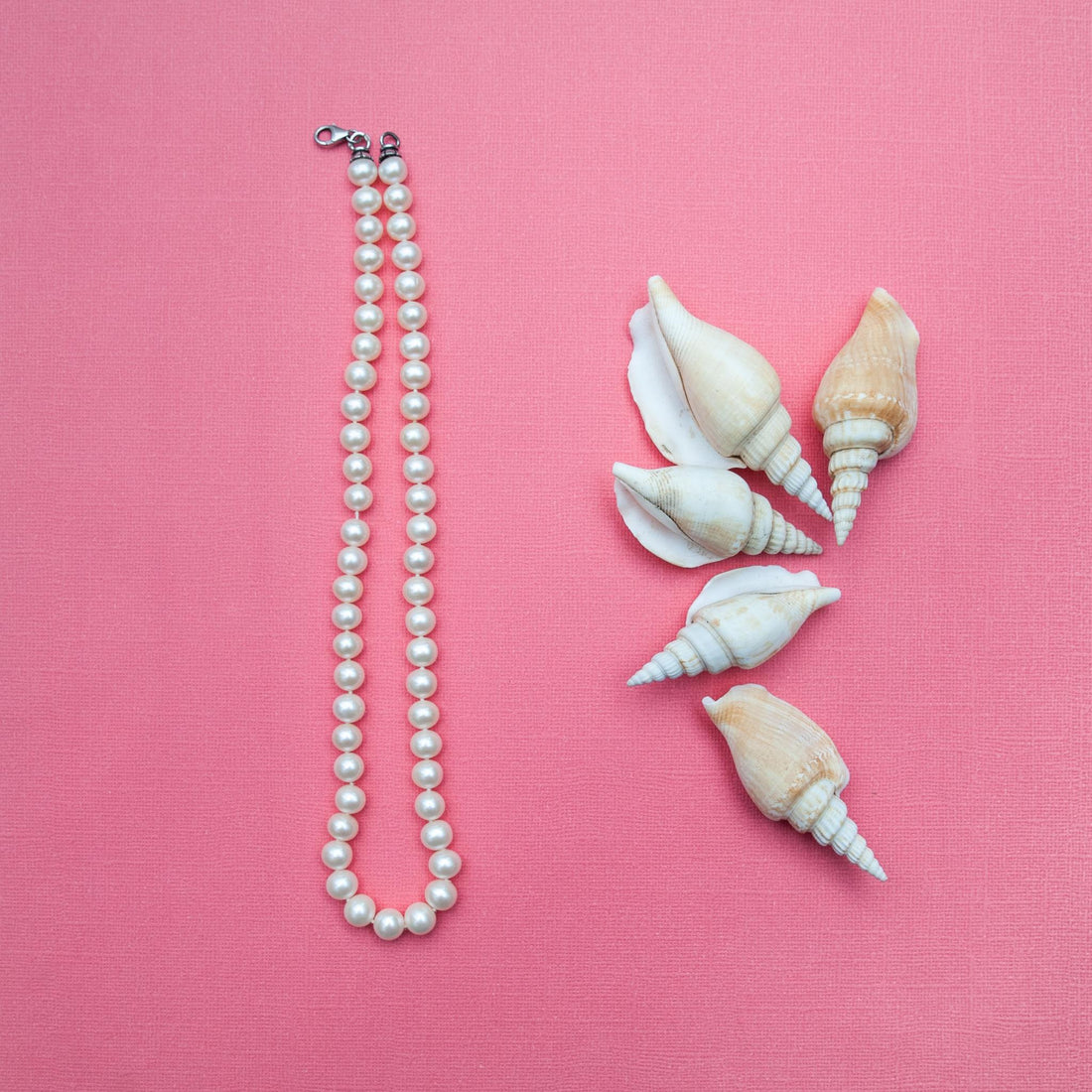 sustainable pearl necklace with boho shells 